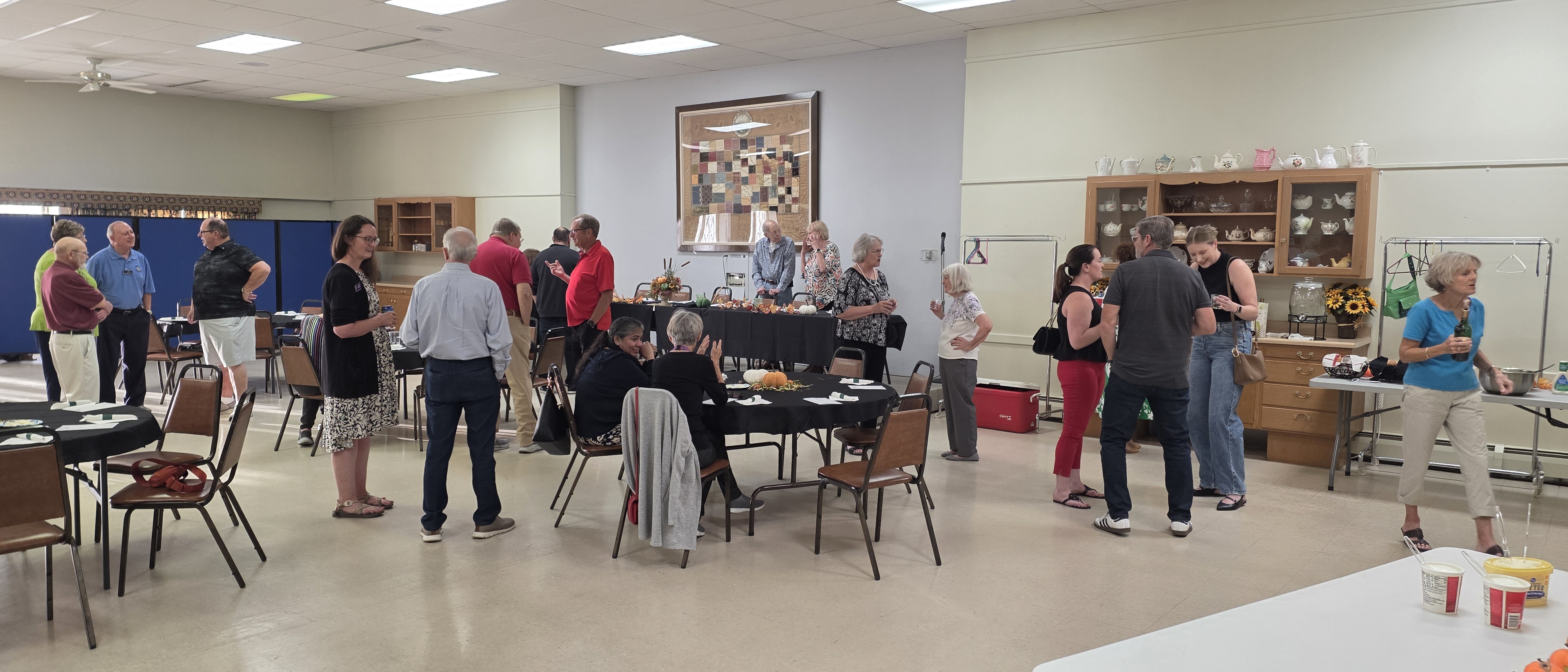 Civitan members and officers socializing at the Officer Installation Dinner 2025